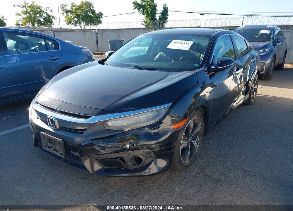 2016 HONDA CIVIC TOURING VIN: 2HGFC1F91GH643526