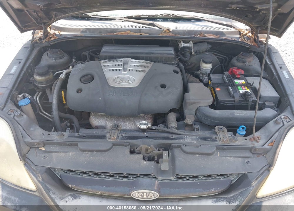 2003 KIA RIO CINCO VIN: KNADC165636145303