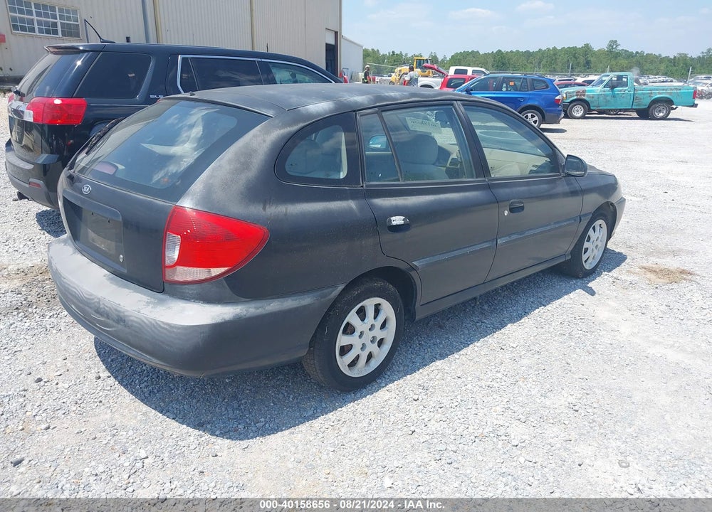 2003 KIA RIO CINCO VIN: KNADC165636145303