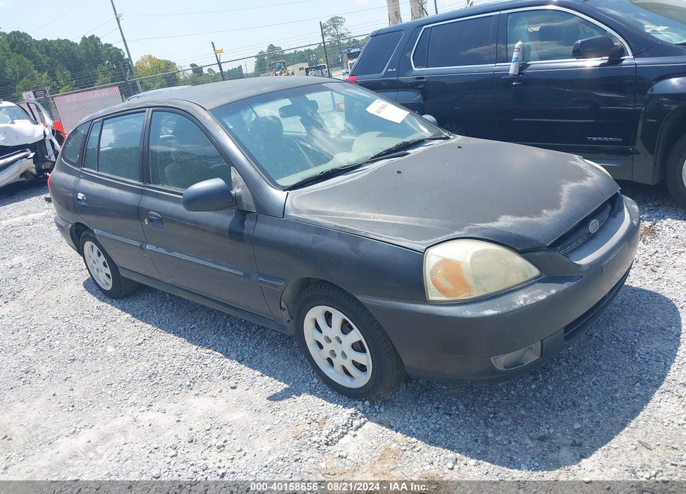 2003 KIA RIO CINCO VIN: KNADC165636145303