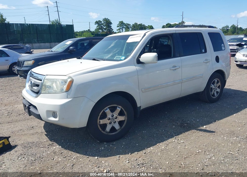 2011 HONDA PILOT TOURING VIN: 5FNYF4H9XBB100008