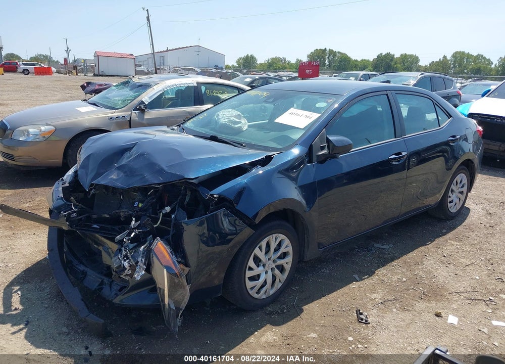 2018 TOYOTA COROLLA LE VIN: 5YFBURHE2JP845652