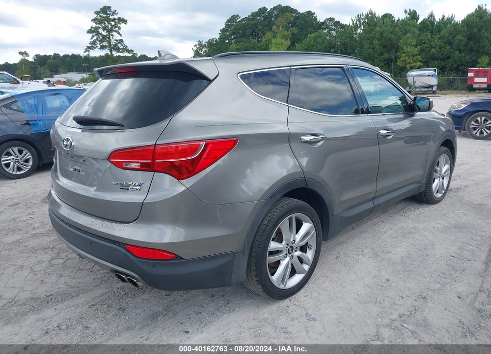 2016 HYUNDAI SANTA FE SPORT 2.0L TURBO VIN: 5XYZWDLA2GG372090