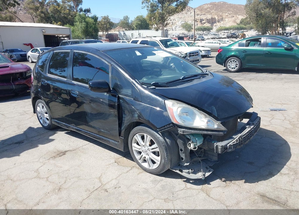 2011 HONDA FIT SPORT VIN: JHMGE8H58BS010702