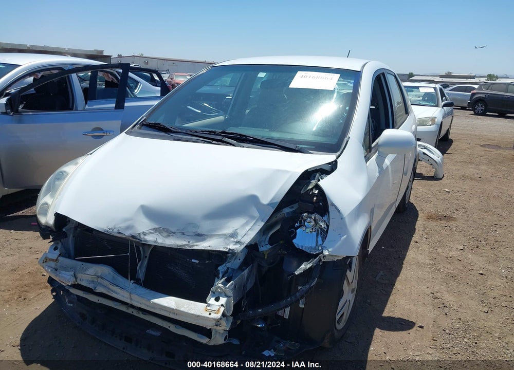 2007 HONDA FIT VIN: JHMGD38467S055853