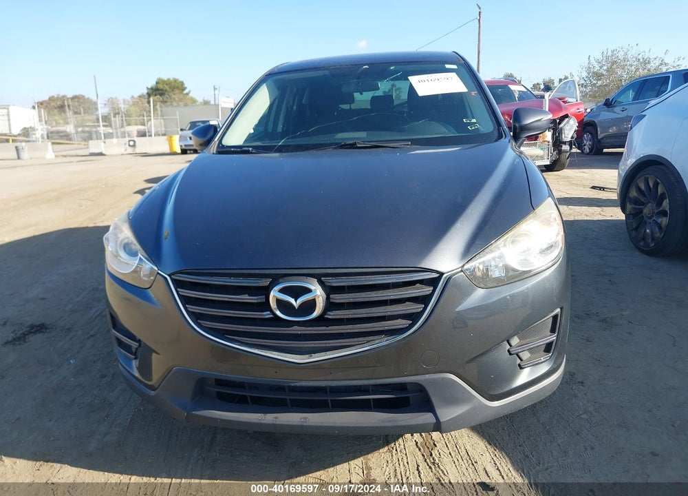 2016 MAZDA CX-5 SPORT VIN: JM3KE2BY6G0671635