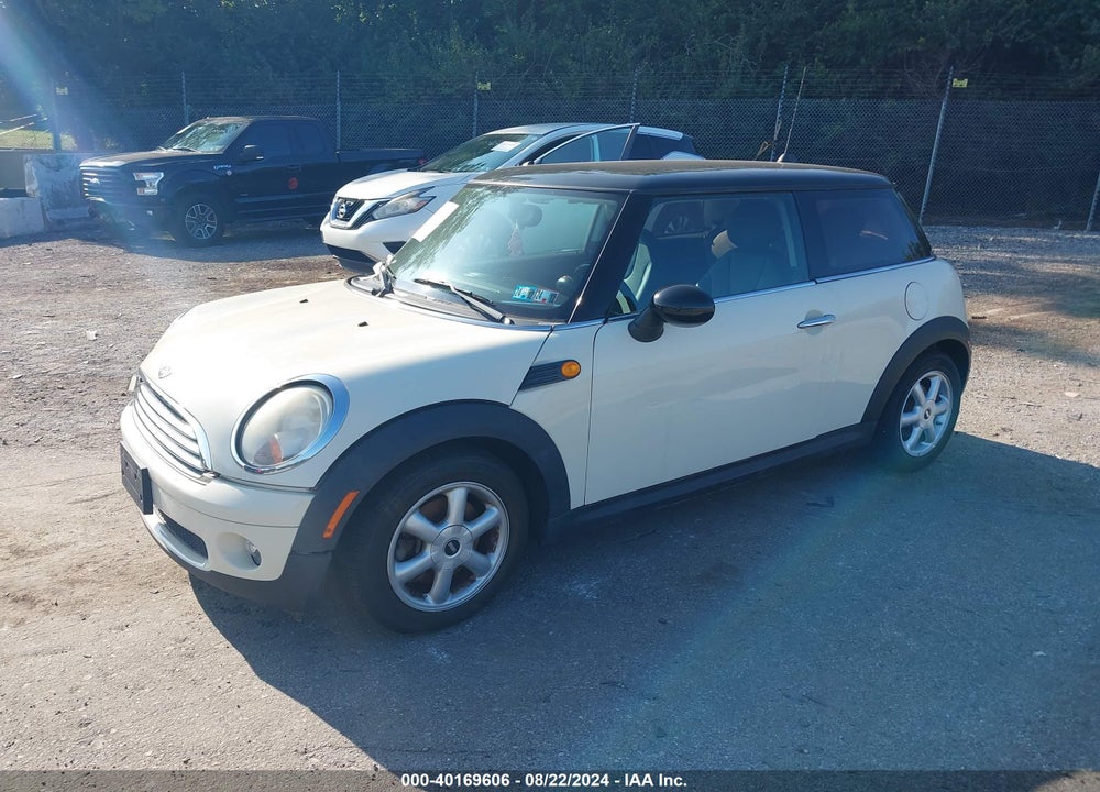 2010 MINI COOPER VIN: WMWMF3C52ATU77728