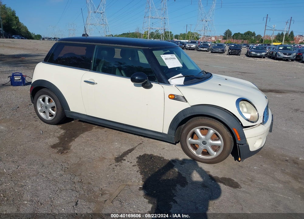 2010 MINI COOPER VIN: WMWMF3C52ATU77728