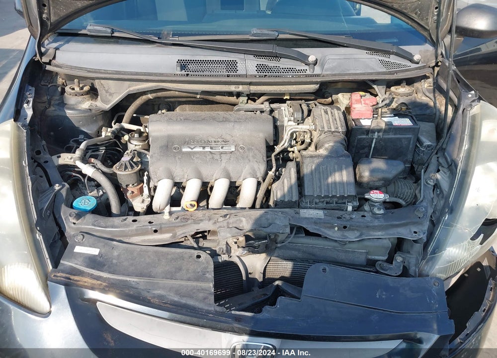 2007 HONDA FIT VIN: JHMGD38667S027682