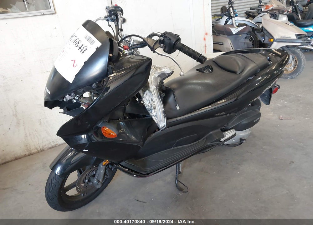 2013 HONDA PCX 150 VIN: MLHKF1217D5005785