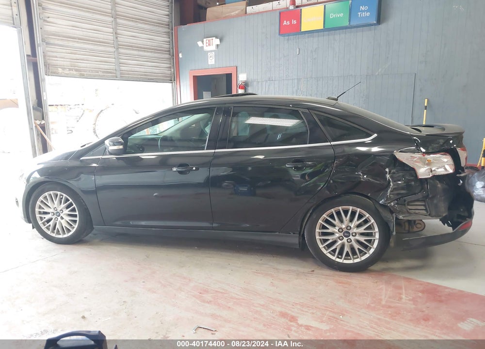 2014 FORD FOCUS TITANIUM VIN: 1FADP3J21EL243259