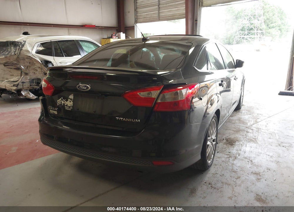 2014 FORD FOCUS TITANIUM VIN: 1FADP3J21EL243259