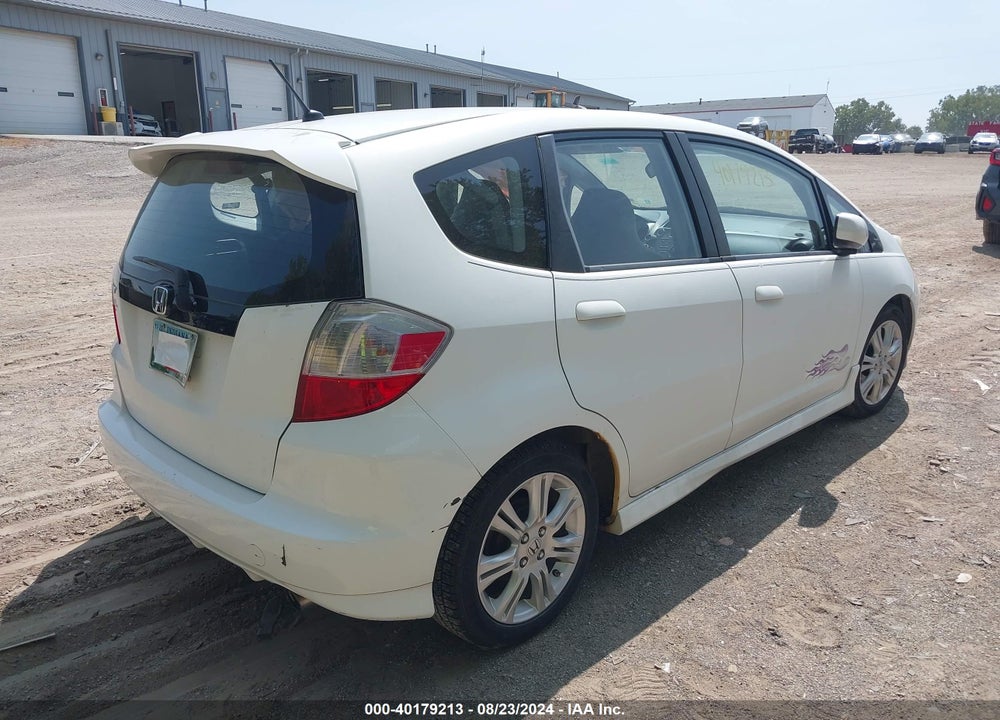 2009 HONDA FIT SPORT VIN: JHMGE88469S021702