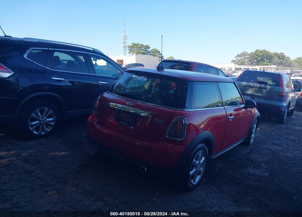 2010 MINI COOPER VIN: WMWMF3C59ATZ60990