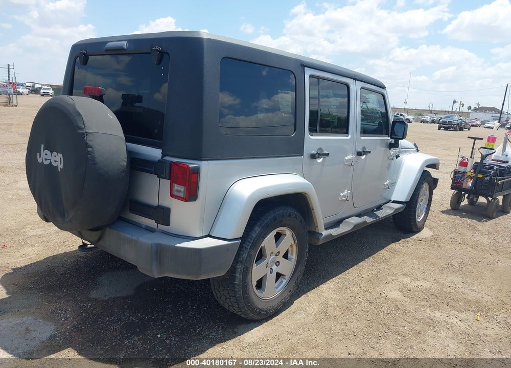 2007 JEEP WRANGLER UNLIMITED SAHARA VIN: 1J4GB59137L142136