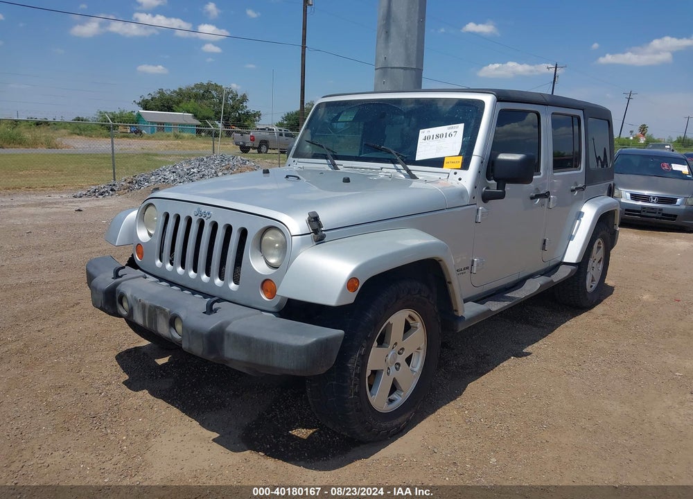2007 JEEP WRANGLER UNLIMITED SAHARA VIN: 1J4GB59137L142136
