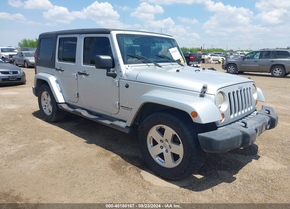 2007 JEEP WRANGLER UNLIMITED SAHARA VIN: 1J4GB59137L142136
