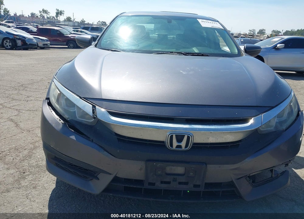 2018 HONDA CIVIC LX VIN: 19XFC2E54JE002411