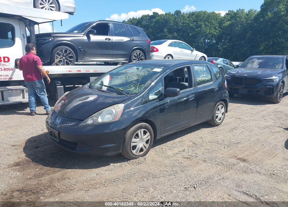 2009 HONDA FIT VIN: JHMGE88279C002133