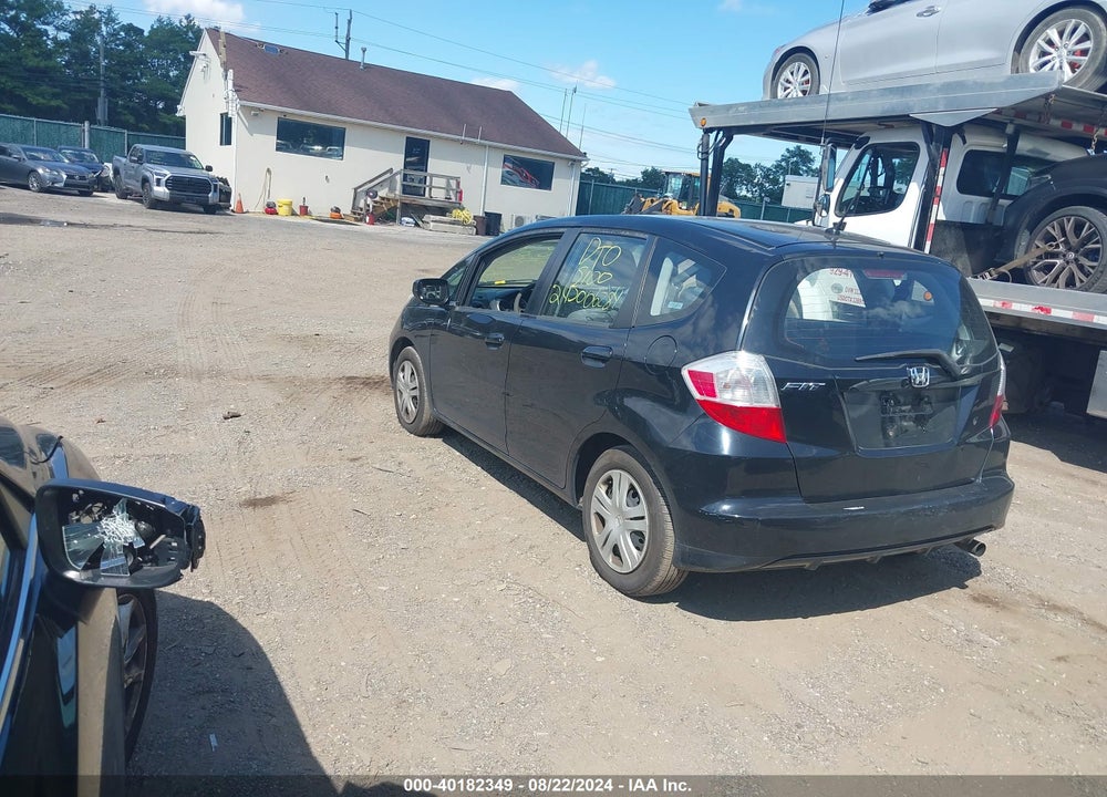2009 HONDA FIT VIN: JHMGE88279C002133