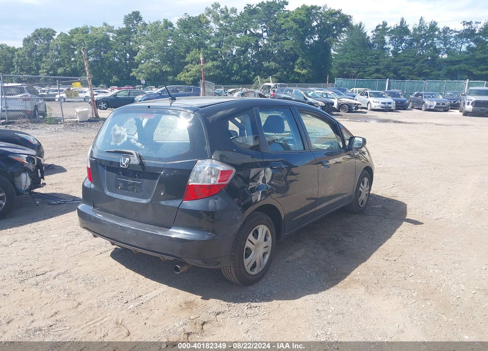 2009 HONDA FIT VIN: JHMGE88279C002133
