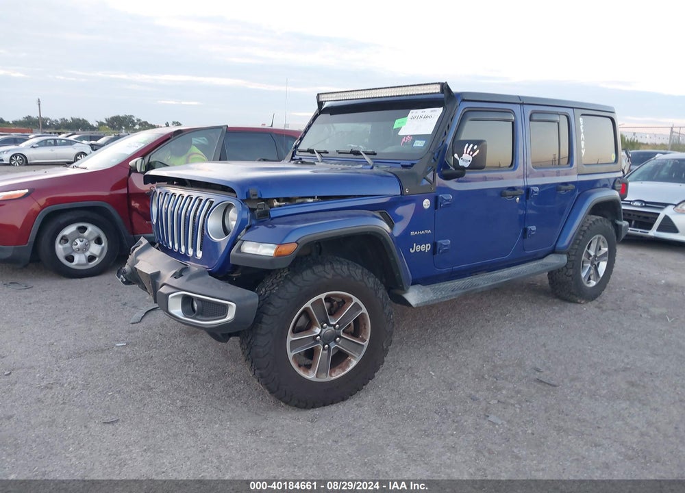 2019 JEEP WRANGLER UNLIMITED SAHARA 4X4 VIN: 1C4HJXEG0KW651739