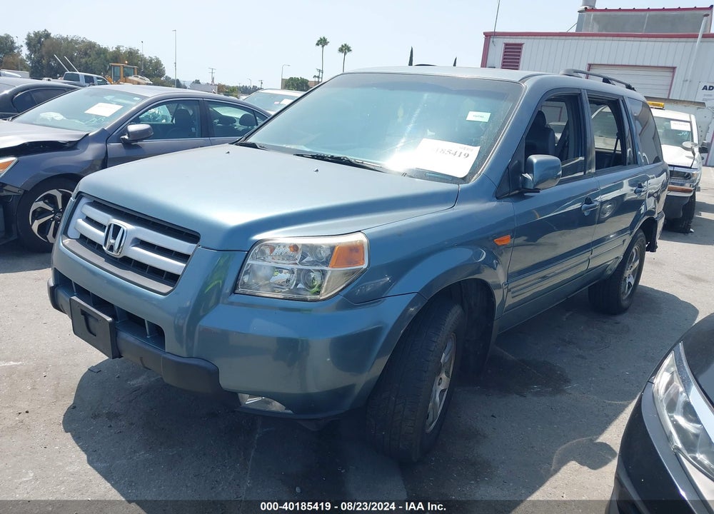 2007 HONDA PILOT EX-L VIN: 5FNYF28707B043716