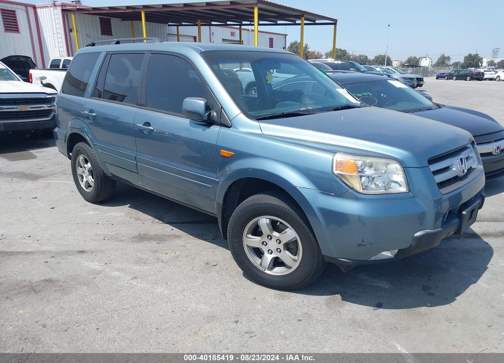 2007 HONDA PILOT EX-L VIN: 5FNYF28707B043716