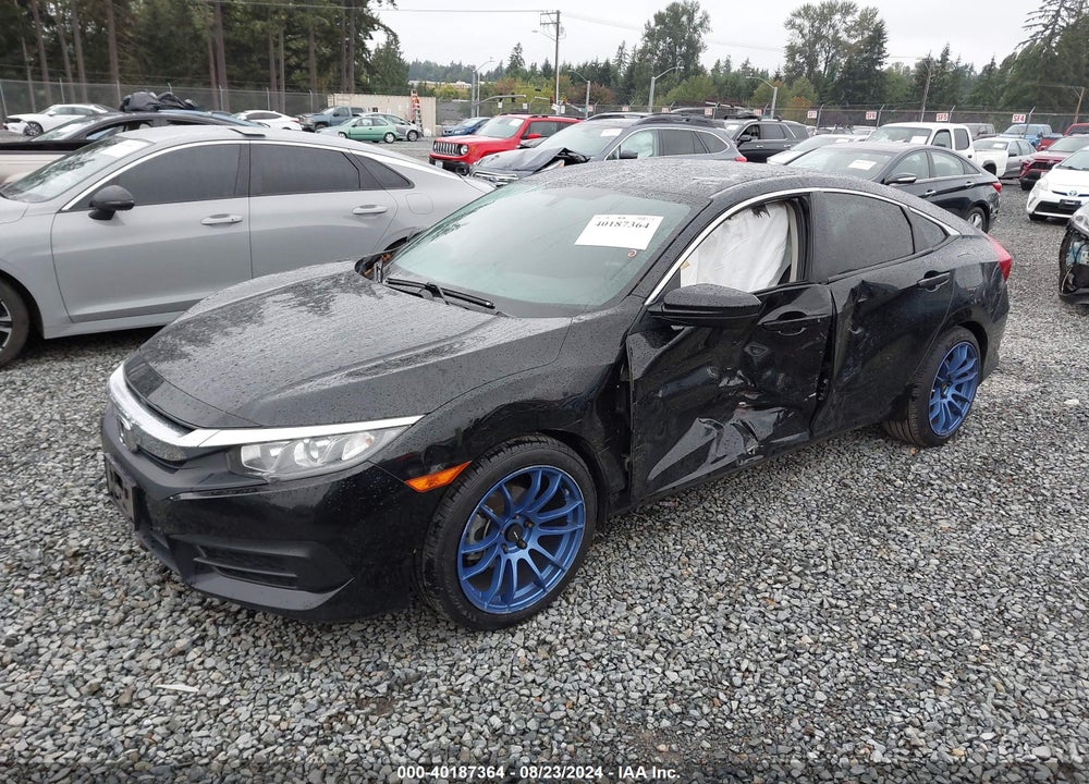 2018 HONDA CIVIC LX VIN: 2HGFC2E5XJH558390