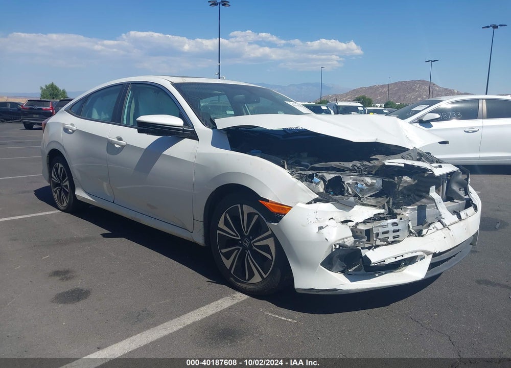 2017 HONDA CIVIC EX-L VIN: 2HGFC1F71HH654977
