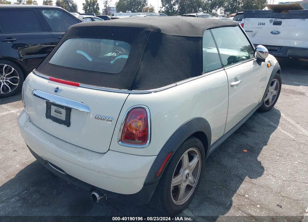 2009 MINI COOPER VIN: WMWMR33579TU95659