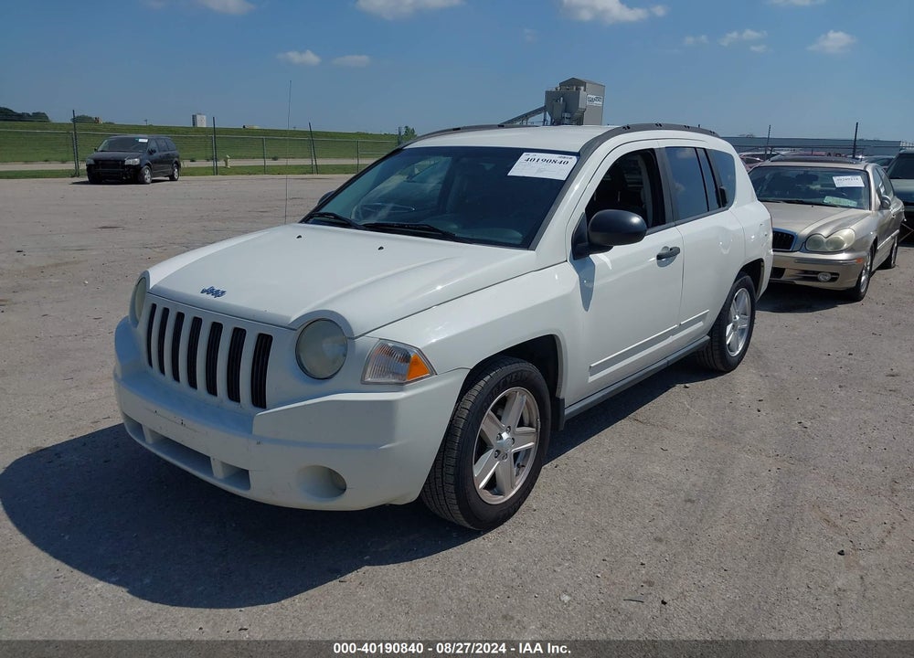 2009 JEEP COMPASS VIN: 1J4FT47B69D102693