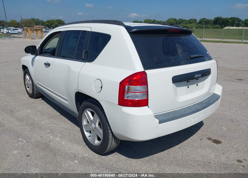 2009 JEEP COMPASS VIN: 1J4FT47B69D102693