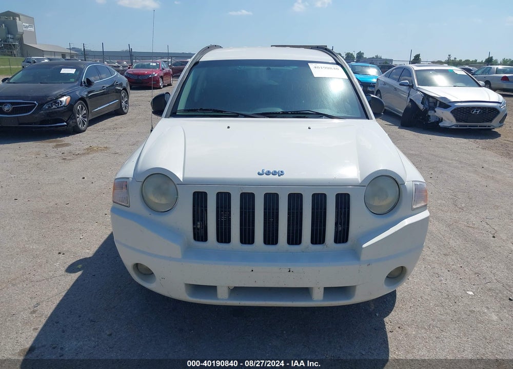 2009 JEEP COMPASS VIN: 1J4FT47B69D102693