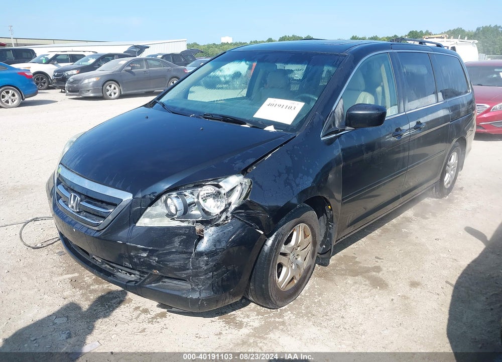 2007 HONDA ODYSSEY EX-L VIN: 5FNRL386X7B109831