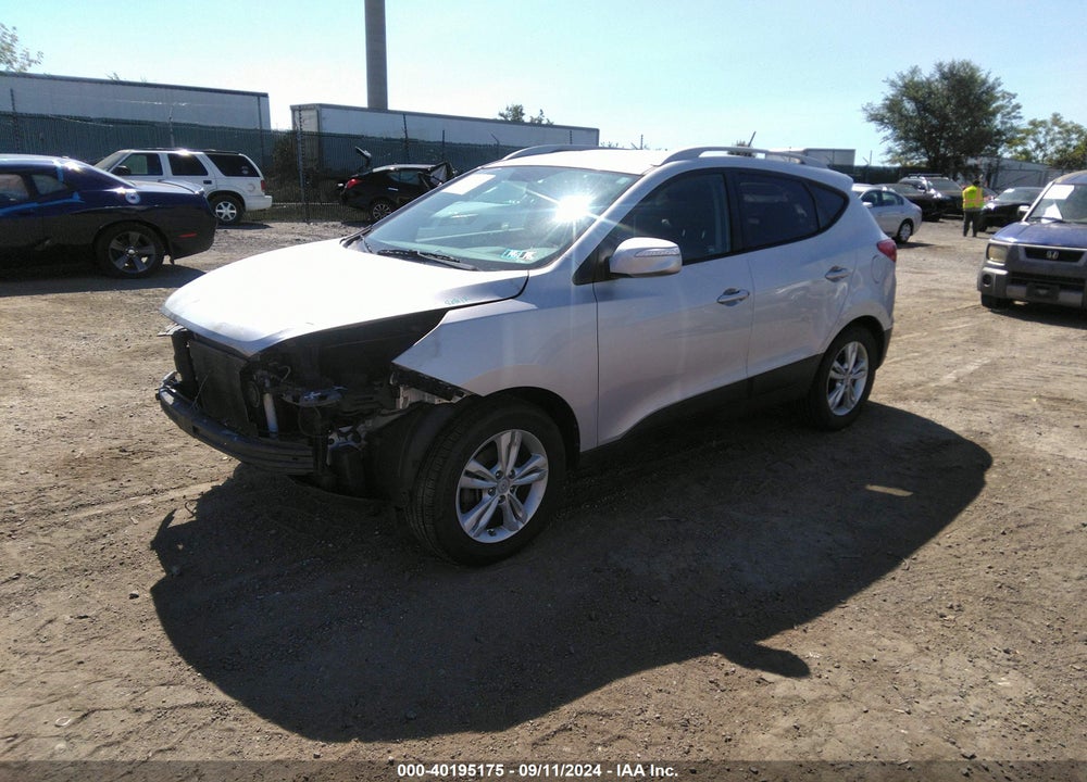 2012 HYUNDAI TUCSON VIN: KM8JUCAC7CU473759