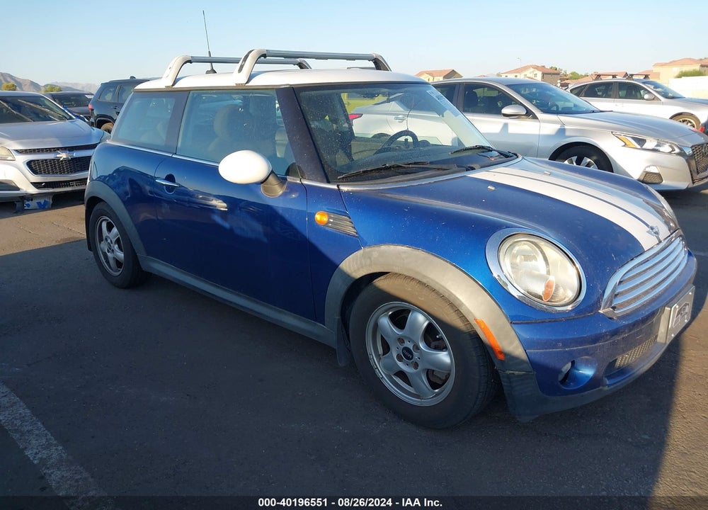 2009 MINI COOPER VIN: WMWMF33559TW70922