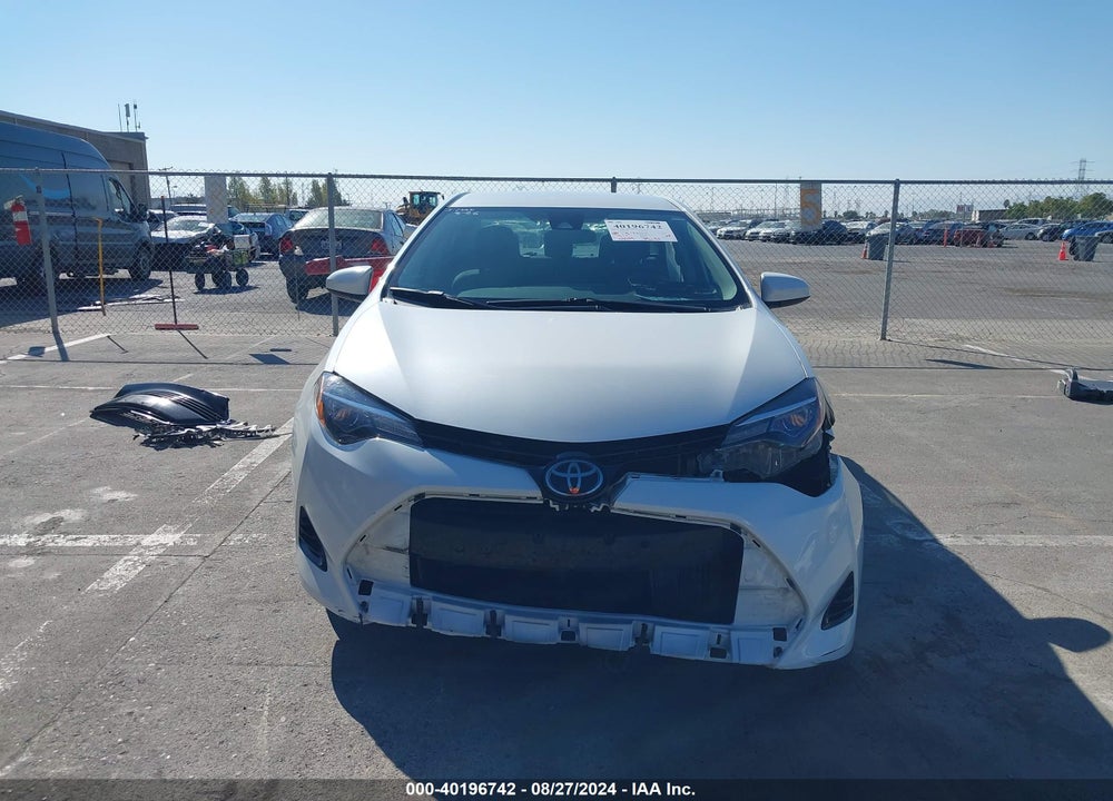2018 TOYOTA COROLLA LE VIN: 5YFBURHE9JP748027