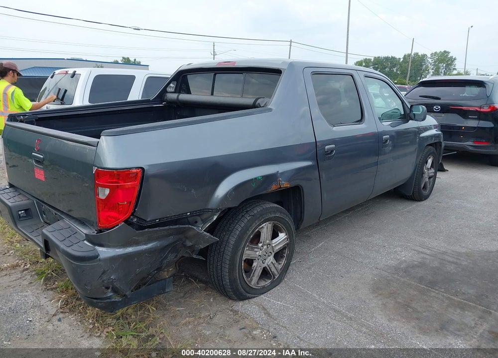 2010 HONDA RIDGELINE RTL VIN: 5FPYK1F53AB002129
