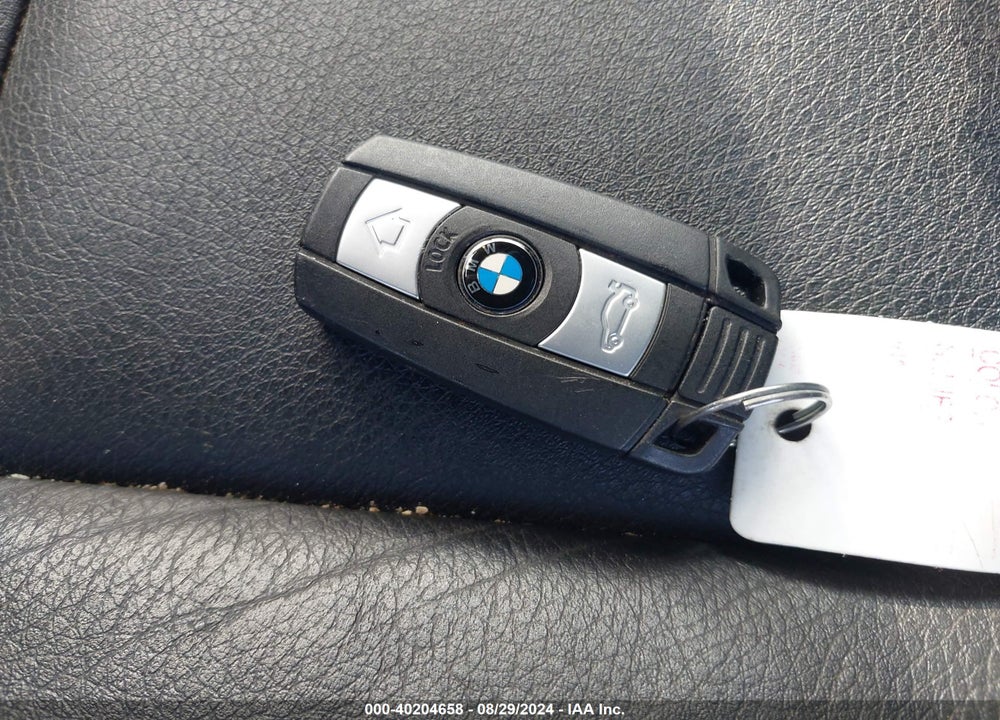2011 BMW 128I VIN: WBAUN1C59BVH83504