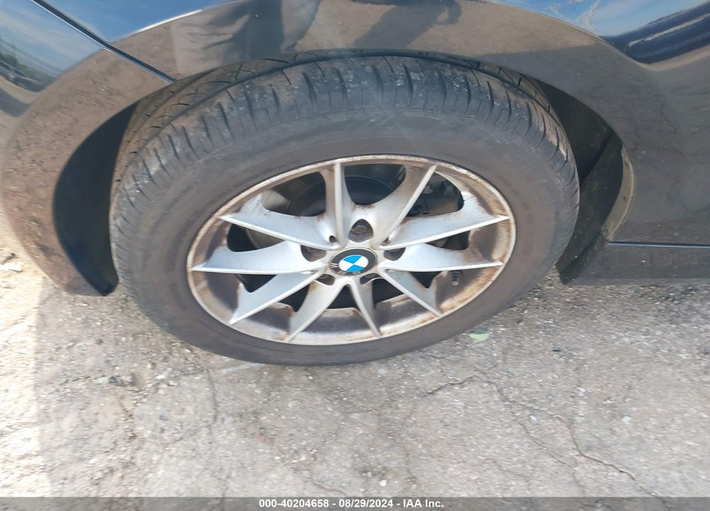 2011 BMW 128I VIN: WBAUN1C59BVH83504