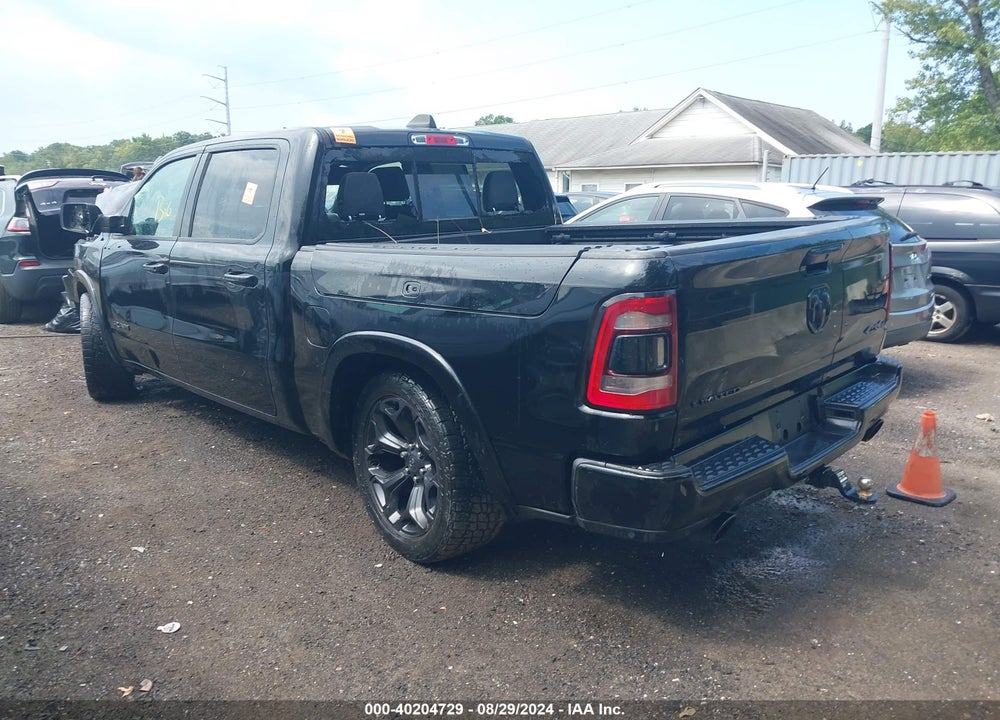 2020 RAM 1500 LIMITED 4X4 5'7 BOX VIN: 1C6SRFHT4LN148036