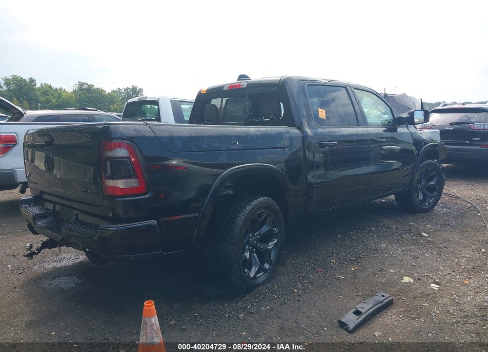 2020 RAM 1500 LIMITED 4X4 5'7 BOX VIN: 1C6SRFHT4LN148036