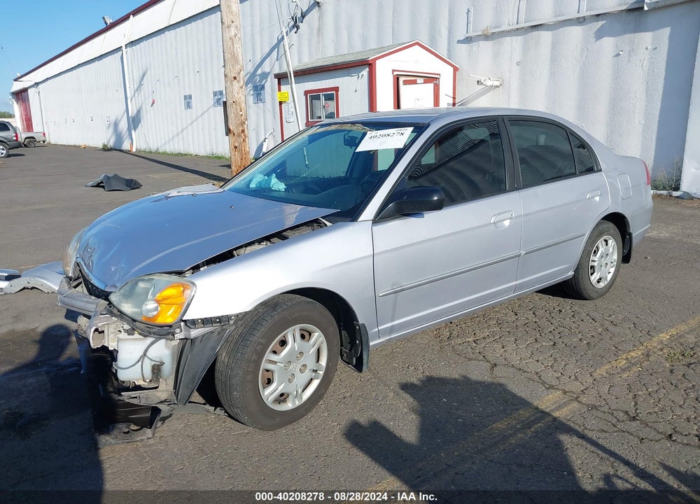 2002 HONDA CIVIC LX VIN: 1HGES16552L080083
