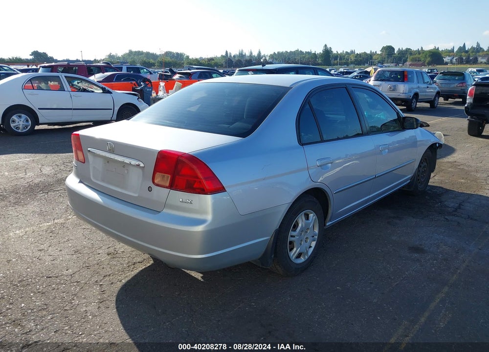 2002 HONDA CIVIC LX VIN: 1HGES16552L080083