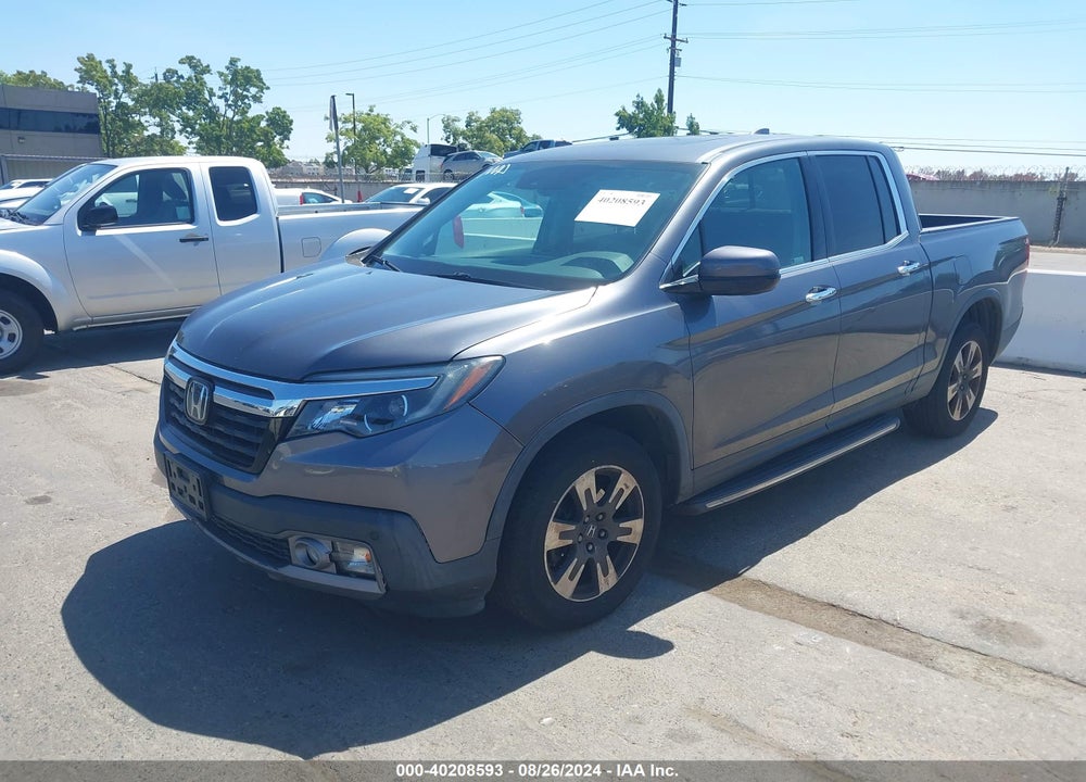 2018 HONDA RIDGELINE RTL-E VIN: 5FPYK3F71JB007519