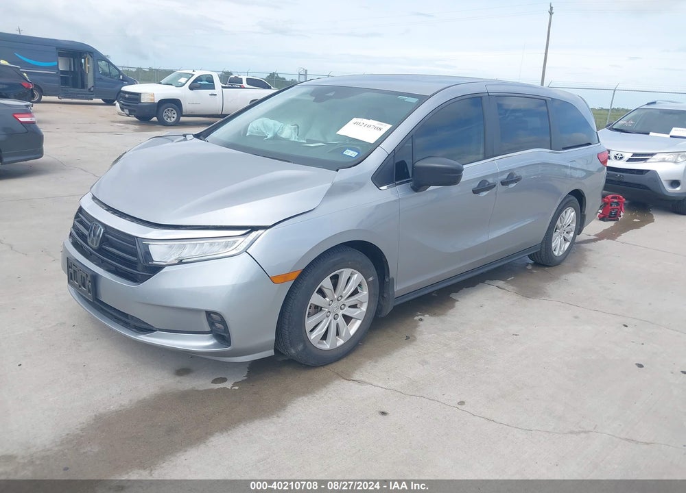 2021 HONDA ODYSSEY LX VIN: 5FNRL6H20MB043753