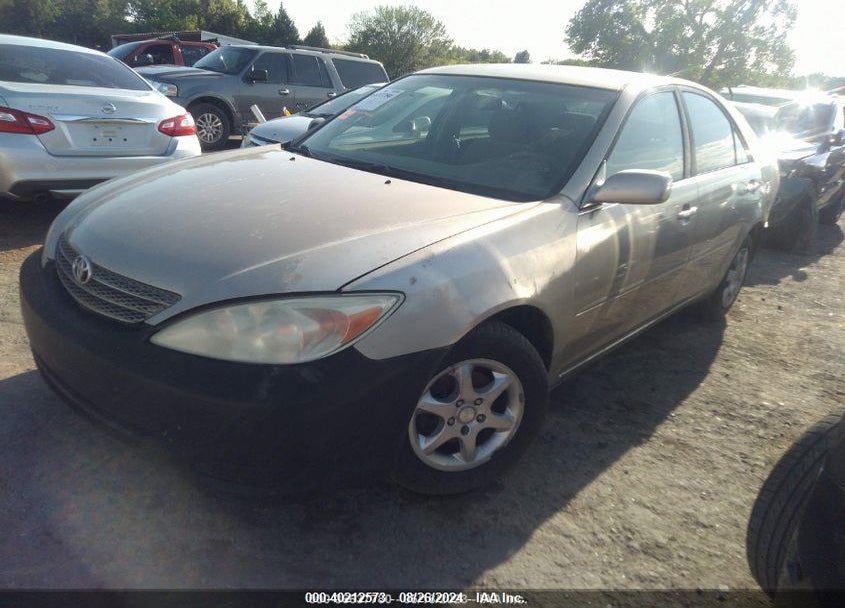 2002 TOYOTA CAMRY LE VIN: JTDBE32K120137414
