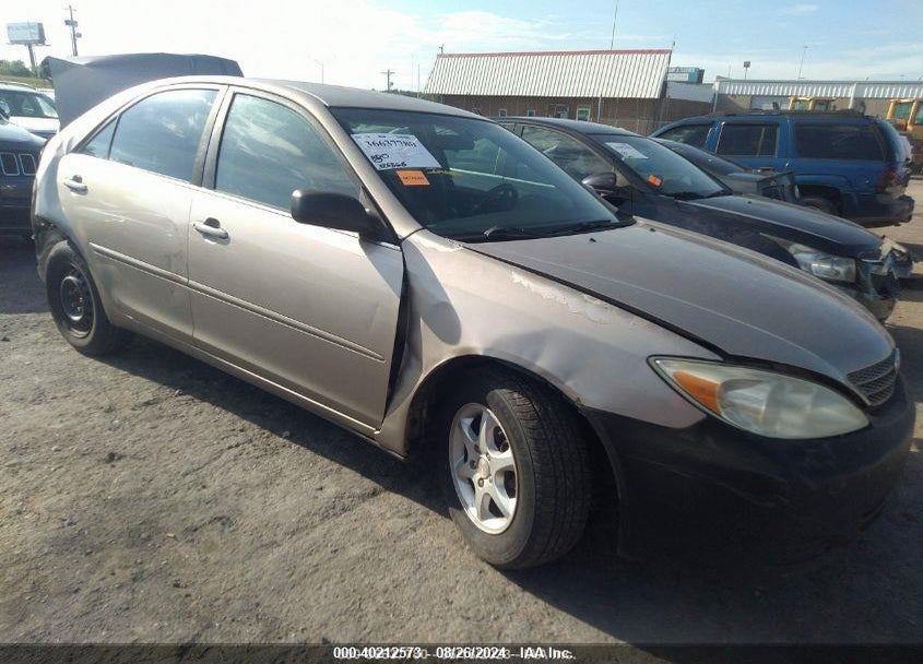 2002 TOYOTA CAMRY LE VIN: JTDBE32K120137414