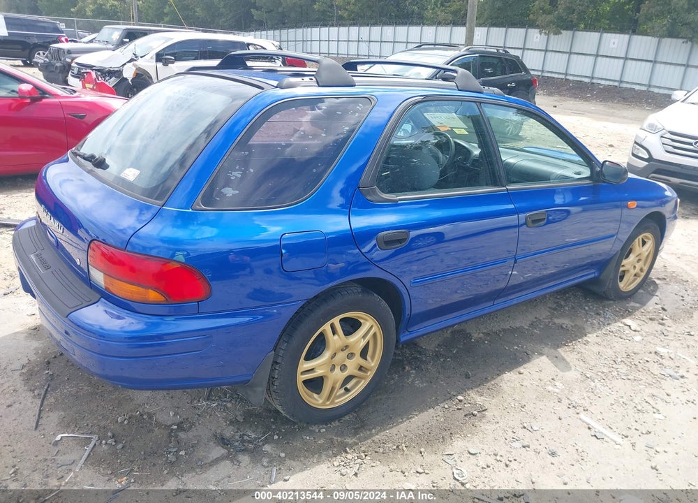 1999 SUBARU IMPREZA OUTBACK SPORT VIN: JF1GF4857XG801990